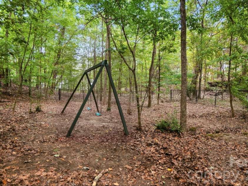 872 Old Bell Road, Charlotte, NC 28270.  MLS# CAR4417666, YatesRealty ID 50105. Backyard with Flat area - endless possibilities...