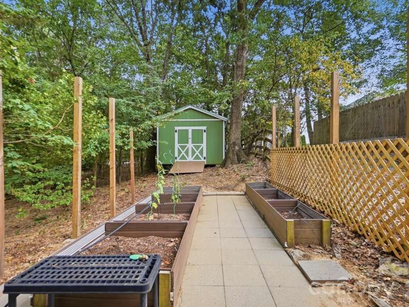 872 Old Bell Road, Charlotte, NC 28270.  MLS# CAR4417666, YatesRealty ID 50105. Raised Planter Beds with drip system