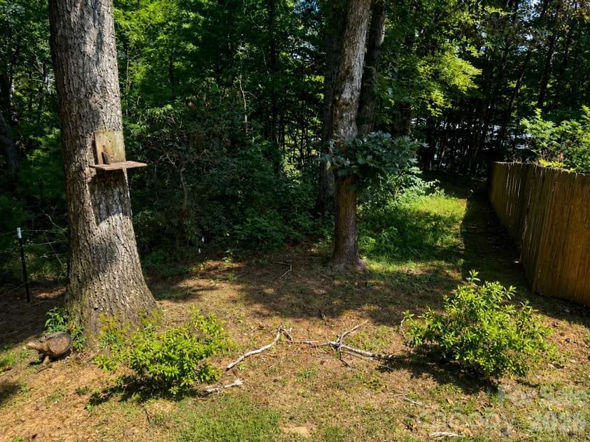 51 Sleepy Forest Drive, Leicester, NC 28748.  MLS# CAR4412266, YatesRealty ID 50110. 