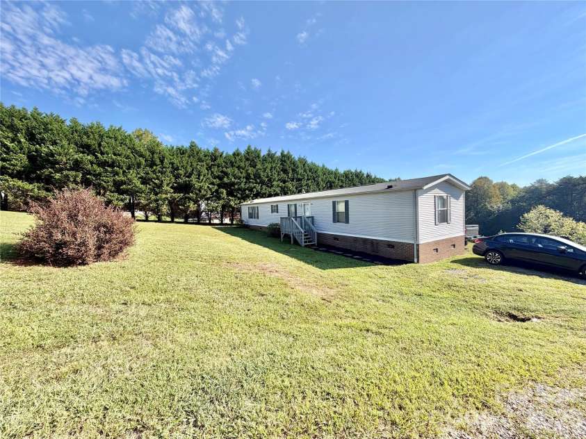115 Mt. Wesley Church Road, Hiddenite, NC 28636.  MLS# CAR4423277, YatesRealty ID 50114. 