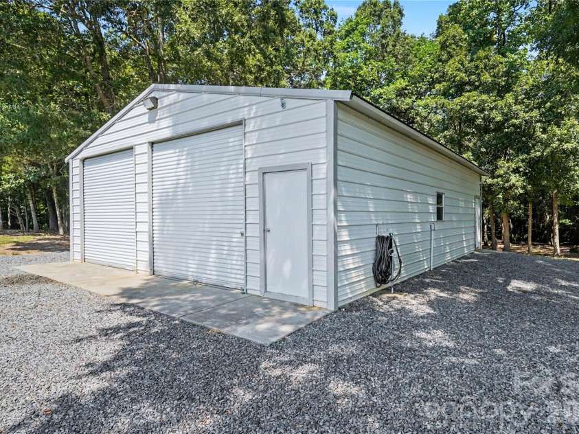 5805 Unionville Brief Road, Monroe, NC 28110.  MLS# CAR4423661, YatesRealty ID 50127. Detached shop/garage