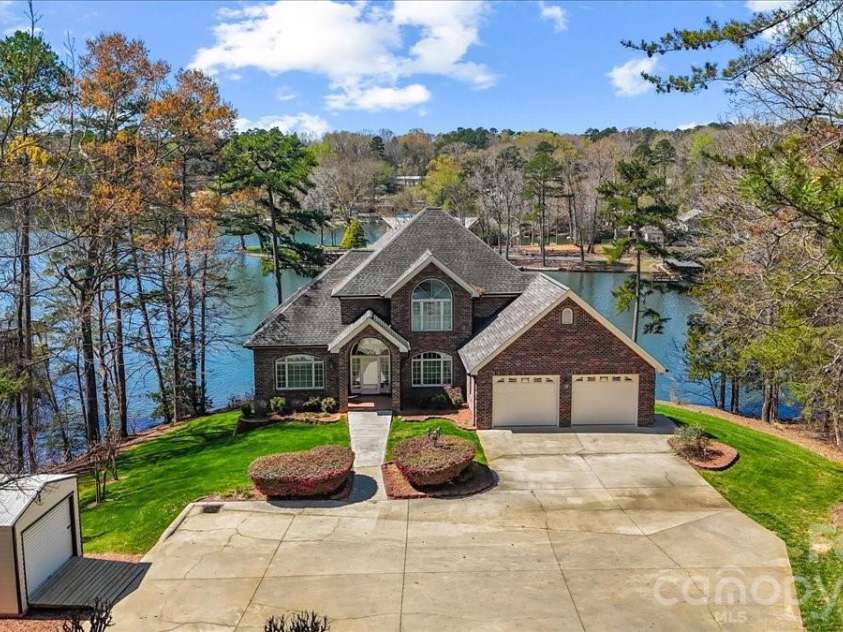 704 Shoreline Drive, New London, NC 28127.  MLS# CAR4361160, YatesRealty ID 50128. 
