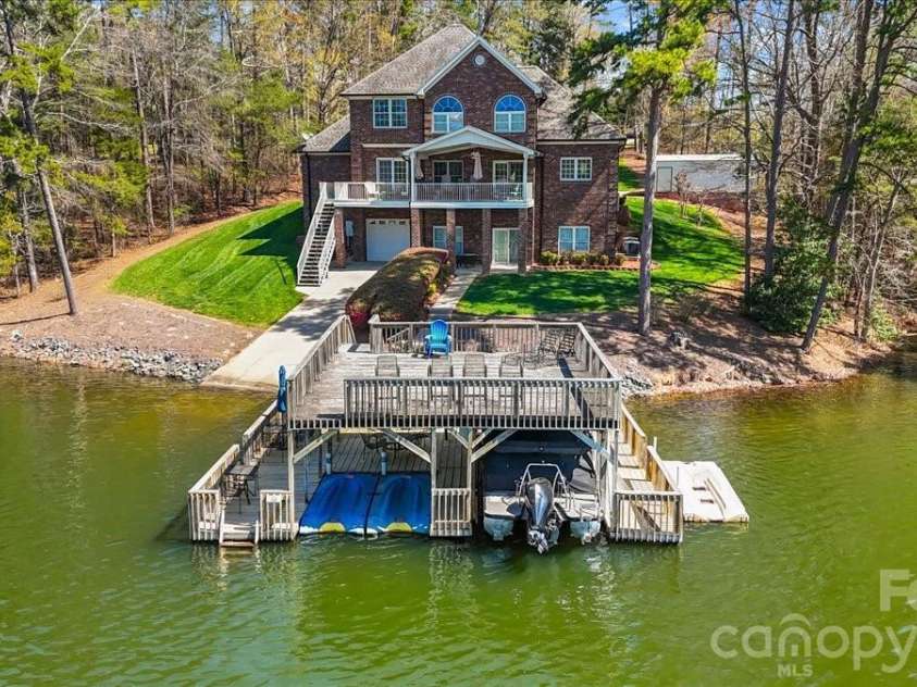 704 Shoreline Drive, New London, NC 28127.  MLS# CAR4361160, YatesRealty ID 50128. 