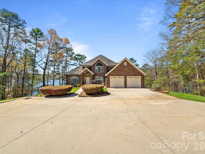 704 Shoreline Drive, New London, NC 28127.  MLS# CAR4361160, YatesRealty ID 50128. 