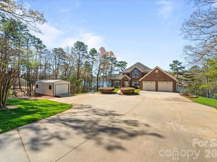 704 Shoreline Drive, New London, NC 28127.  MLS# CAR4361160, YatesRealty ID 50128. 