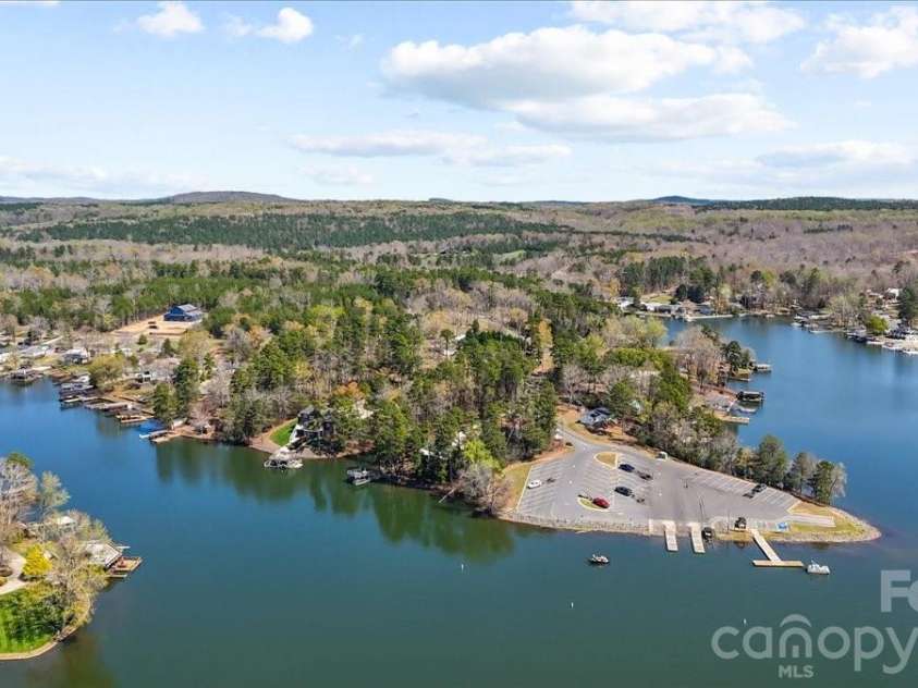 704 Shoreline Drive, New London, NC 28127.  MLS# CAR4361160, YatesRealty ID 50128. 
