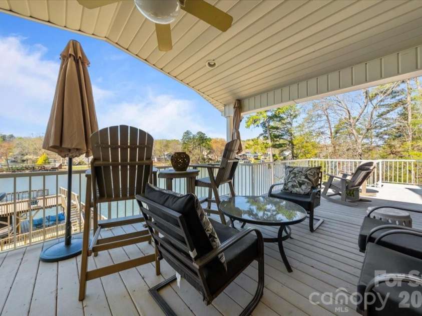 704 Shoreline Drive, New London, NC 28127.  MLS# CAR4361160, YatesRealty ID 50128. 