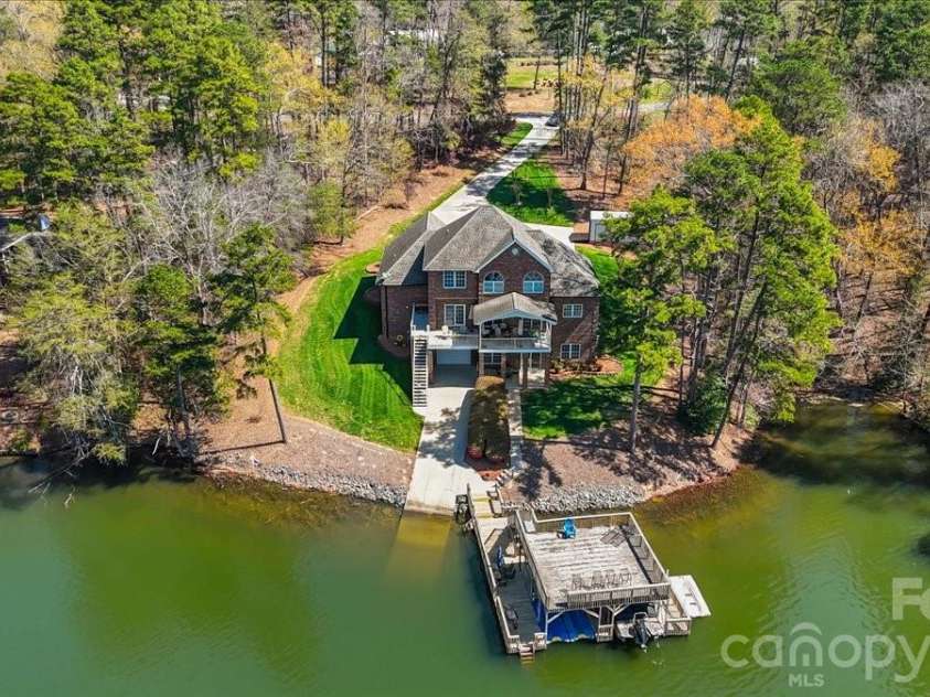 704 Shoreline Drive, New London, NC 28127.  MLS# CAR4361160, YatesRealty ID 50128. 