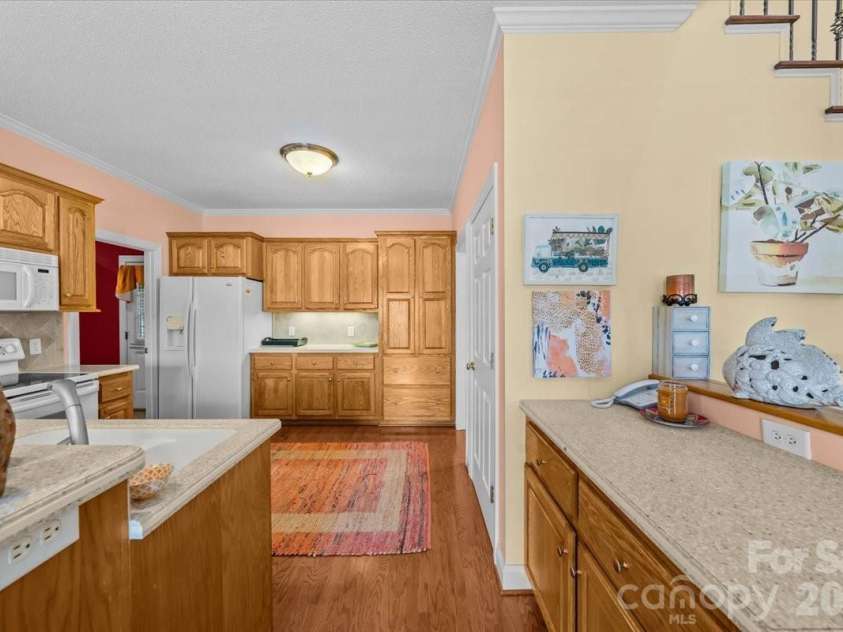 704 Shoreline Drive, New London, NC 28127.  MLS# CAR4361160, YatesRealty ID 50128. 