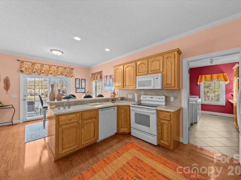 704 Shoreline Drive, New London, NC 28127.  MLS# CAR4361160, YatesRealty ID 50128. 