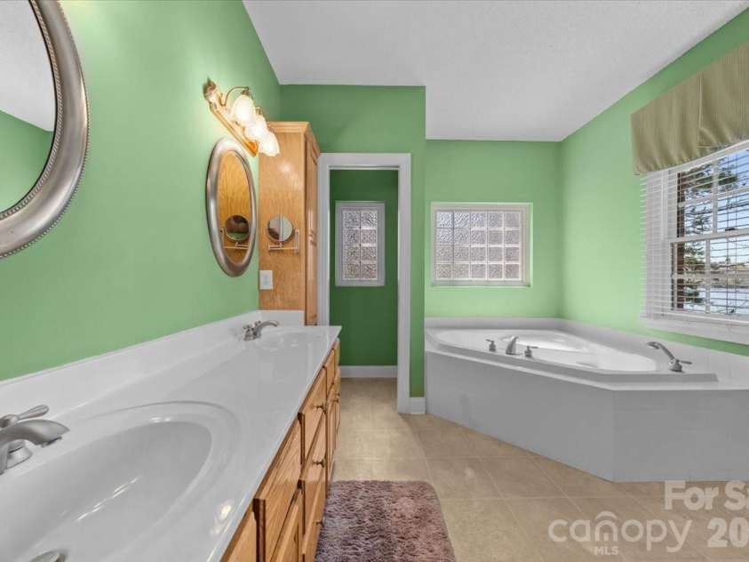 704 Shoreline Drive, New London, NC 28127.  MLS# CAR4361160, YatesRealty ID 50128. 