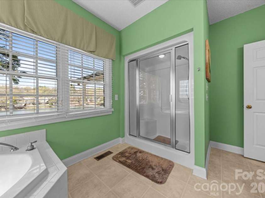 704 Shoreline Drive, New London, NC 28127.  MLS# CAR4361160, YatesRealty ID 50128. 