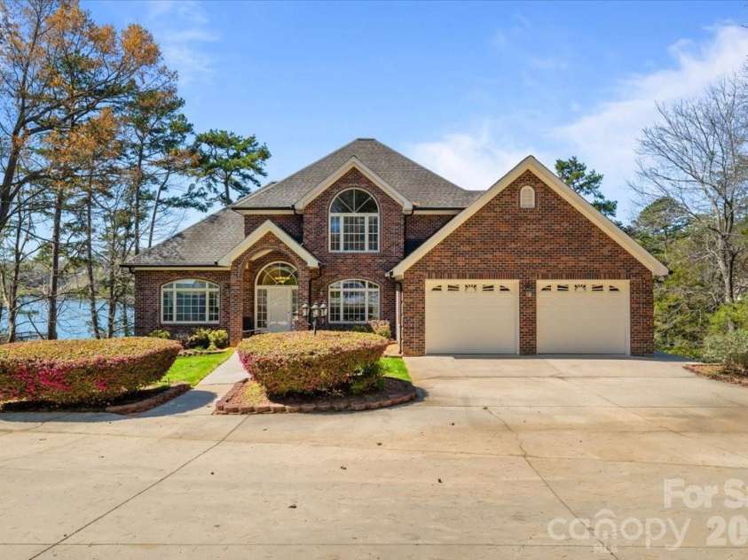704 Shoreline Drive, New London, NC 28127.  MLS# CAR4361160, YatesRealty ID 50128. 