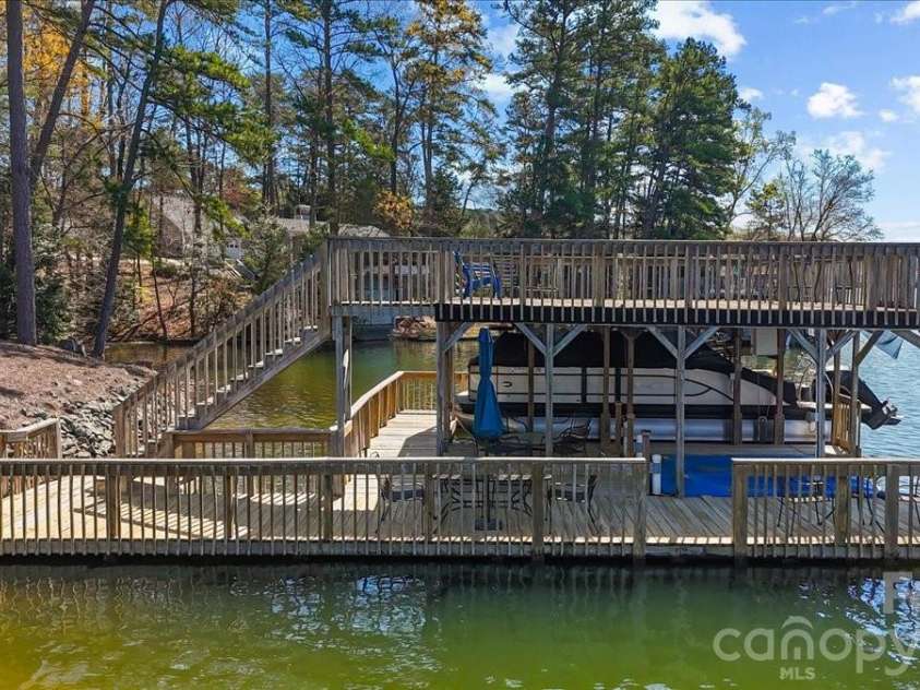 704 Shoreline Drive, New London, NC 28127.  MLS# CAR4361160, YatesRealty ID 50128. 