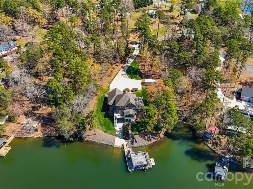704 Shoreline Drive, New London, NC 28127.  MLS# CAR4361160, YatesRealty ID 50128. 