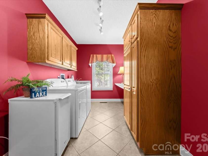 704 Shoreline Drive, New London, NC 28127.  MLS# CAR4361160, YatesRealty ID 50128. Laundry Room