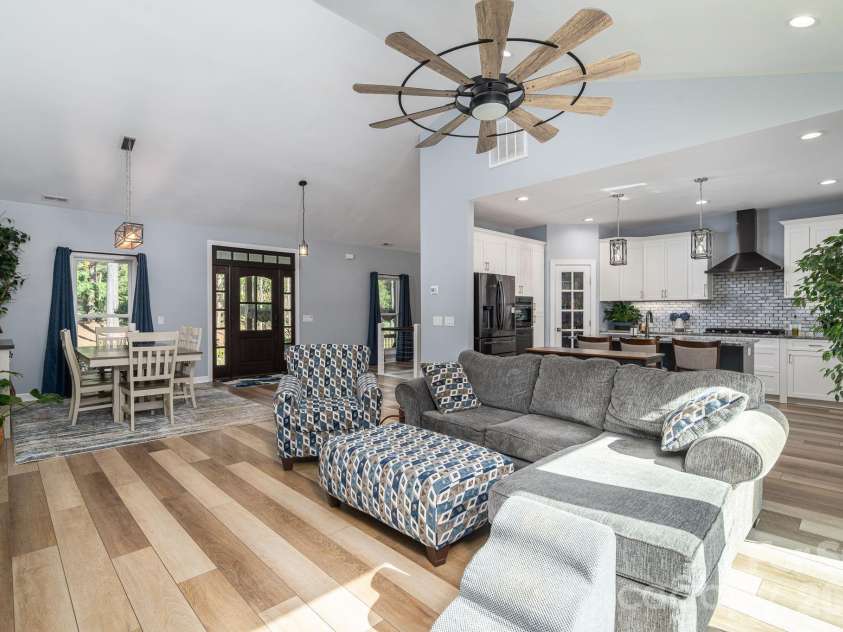 1551 Brevard Place Road, Iron Station, NC 28080.  MLS# CAR4422440, YatesRealty ID 50132. Spacious open-concept living, dining, and kitchen area designed for easy everyday living and entertaining.