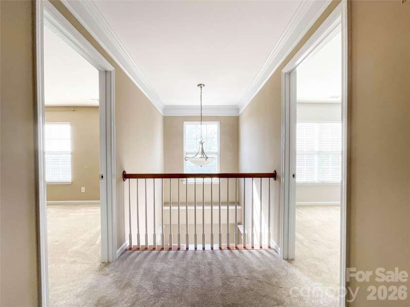 1112 Tranquil Falls Lane, Matthews, NC 28104.  MLS# CAR4422418, YatesRealty ID 50155. 