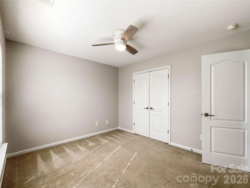 1112 Tranquil Falls Lane, Matthews, NC 28104.  MLS# CAR4422418, YatesRealty ID 50155. Bedroom 3