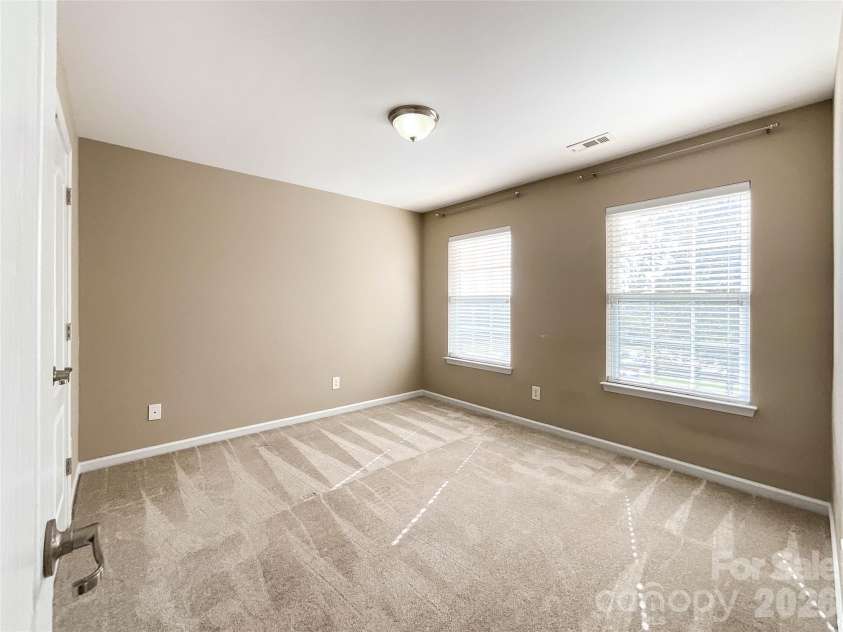 1112 Tranquil Falls Lane, Matthews, NC 28104.  MLS# CAR4422418, YatesRealty ID 50155. Bedroom 4
