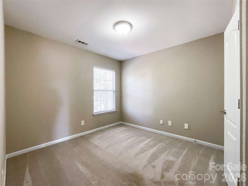 1112 Tranquil Falls Lane, Matthews, NC 28104.  MLS# CAR4422418, YatesRealty ID 50155. Bedroom 5