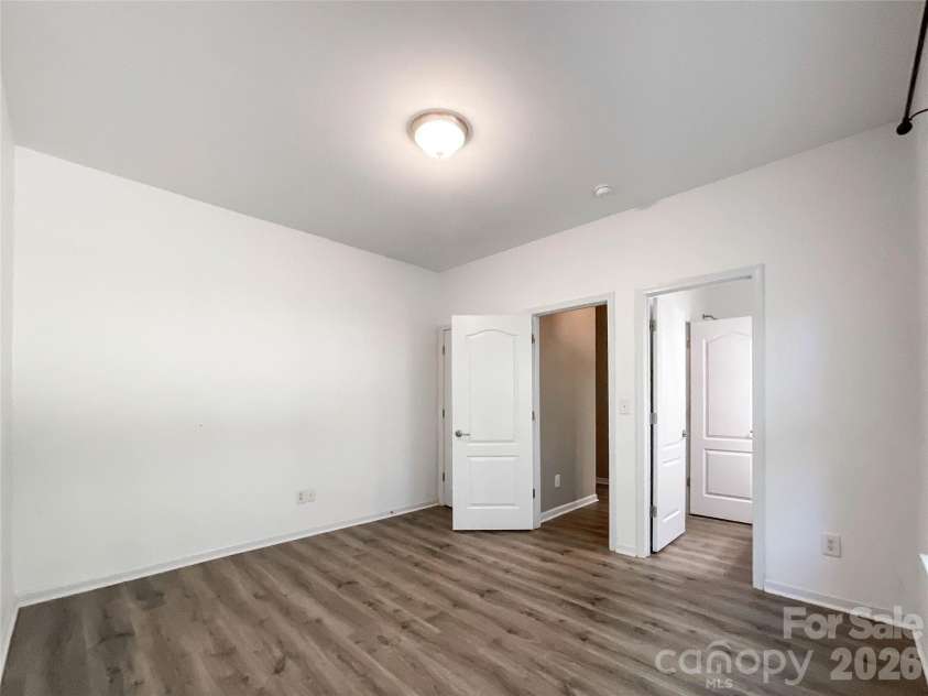 1112 Tranquil Falls Lane, Matthews, NC 28104.  MLS# CAR4422418, YatesRealty ID 50155. Bedroom on Main
