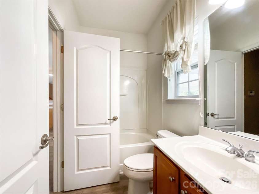 1112 Tranquil Falls Lane, Matthews, NC 28104.  MLS# CAR4422418, YatesRealty ID 50155. Full Bath on main