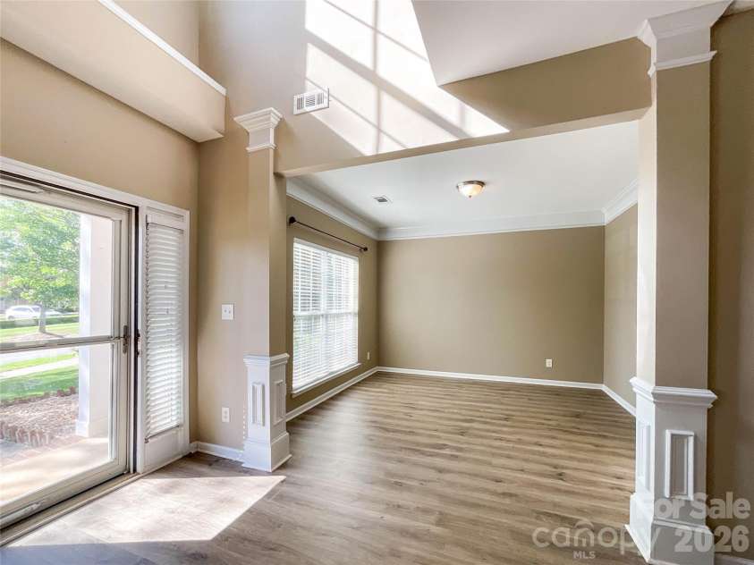 1112 Tranquil Falls Lane, Matthews, NC 28104.  MLS# CAR4422418, YatesRealty ID 50155. Living room/ Office
