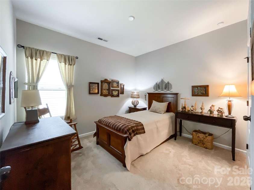 2005 Yellow Daisy Drive, Matthews, NC 28104.  MLS# CAR4422414, YatesRealty ID 50156. Bedroom 2