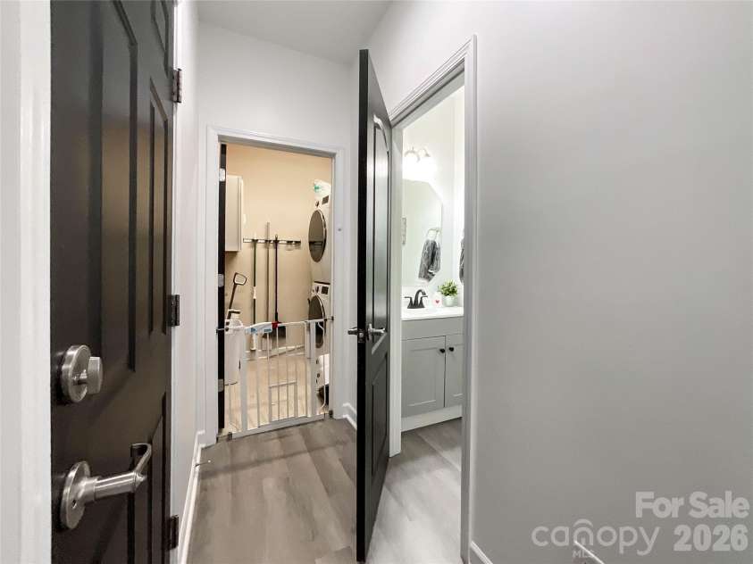 6019 Grassy Knoll Circle, Matthews, NC 28104.  MLS# CAR4422466, YatesRealty ID 50157. Laundry room on main