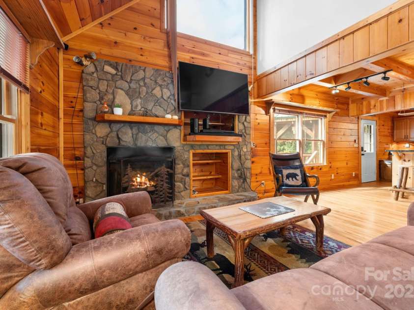 80 Slow Lane, Whittier, NC 28789.  MLS# CAR4307656, YatesRealty ID 5016. Living room (angle from front door)