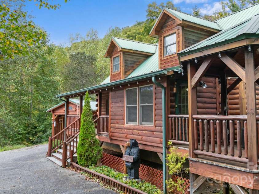 80 Slow Lane, Whittier, NC 28789.  MLS# CAR4307656, YatesRealty ID 5016. Side view of house