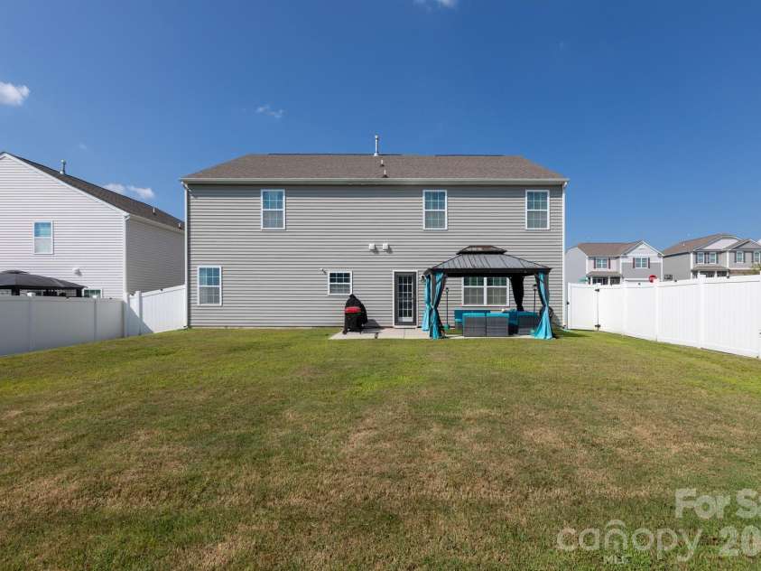 1353 Melon Colony Avenue, Concord, NC 28027.  MLS# CAR4422273, YatesRealty ID 50170. Backyard View 1