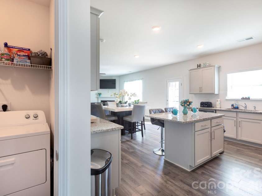 1353 Melon Colony Avenue, Concord, NC 28027.  MLS# CAR4422273, YatesRealty ID 50170. Laundary Room and Kitchen
