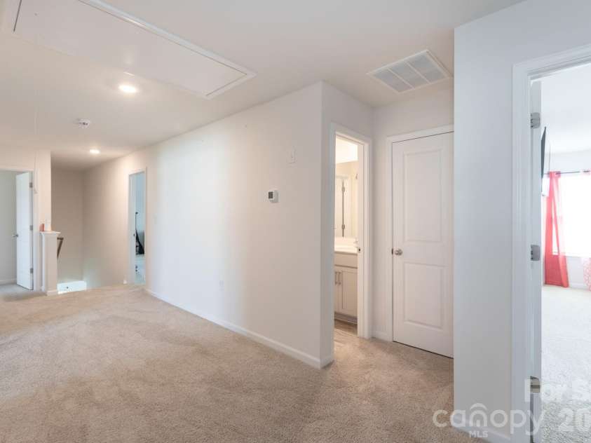 1353 Melon Colony Avenue, Concord, NC 28027.  MLS# CAR4422273, YatesRealty ID 50170. Upstairs Hallway Open area View 2