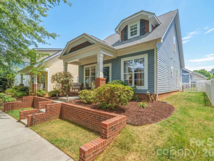 14525 Holly Springs Drive, Huntersville, NC 28078.  MLS# CAR4421540, YatesRealty ID 50173. Exterior front
