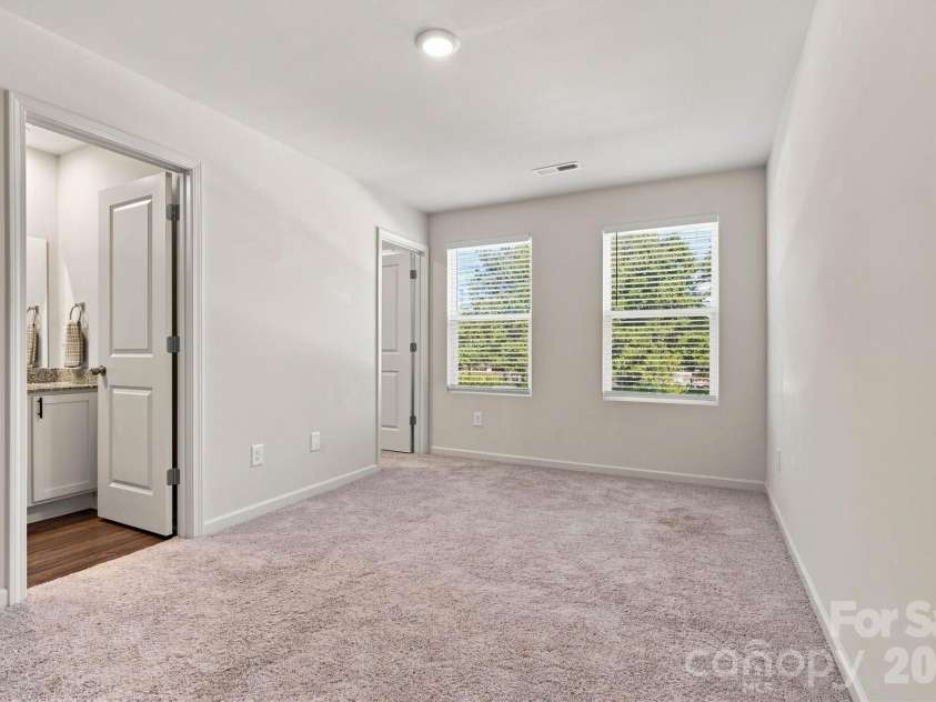 107 Villa Lane, Lincolnton, NC 28092.  MLS# CAR4421797, YatesRealty ID 50176. Primary Suite | Spacious & Filled with Natural Light