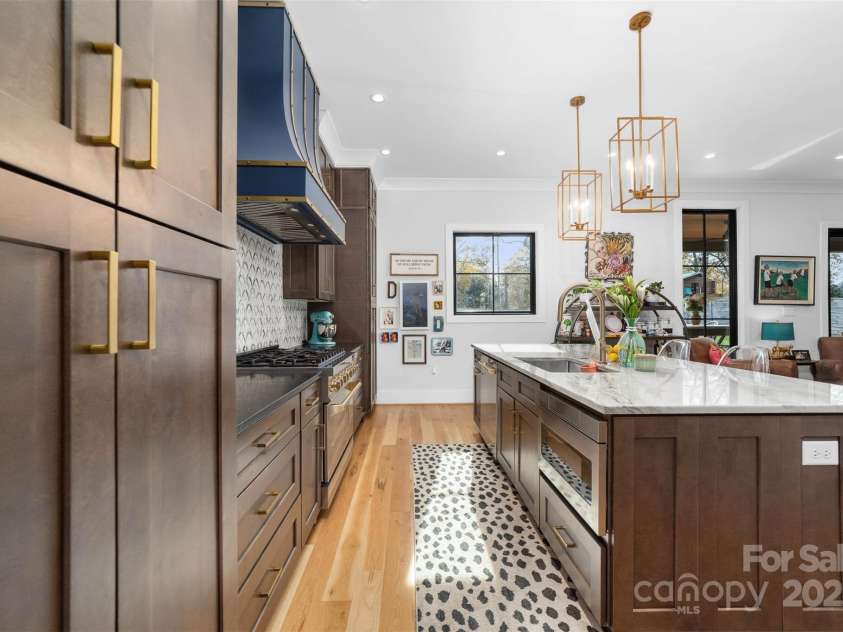1014 Woodside Avenue, Charlotte, NC 28205.  MLS# CAR4323196, YatesRealty ID 5018. Microwave inserted in kitchen island