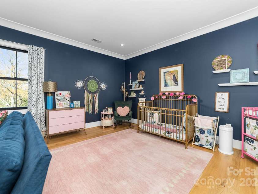 1014 Woodside Avenue, Charlotte, NC 28205.  MLS# CAR4323196, YatesRealty ID 5018. Secondary bedroom on main level that can also be utilized as a bonus room