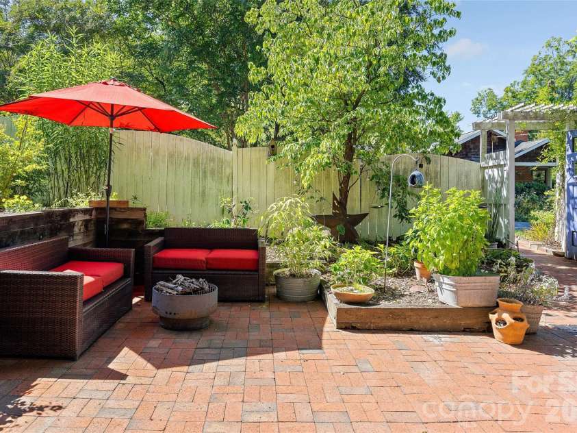 1900 Thomas Avenue, Charlotte, NC 28205.  MLS# CAR4421719, YatesRealty ID 50182. Brick Patio