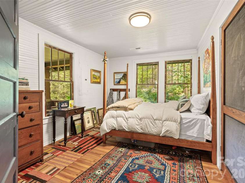 95 Chestnut Hill Loop Road, Gerton, NC 28735.  MLS# CAR4420243, YatesRealty ID 50183. Lower level bedroom