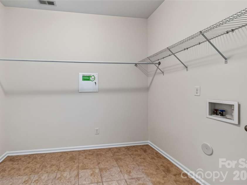 17323 Silas Place Drive, Davidson, NC 28036.  MLS# CAR4420635, YatesRealty ID 50185. Laundry room