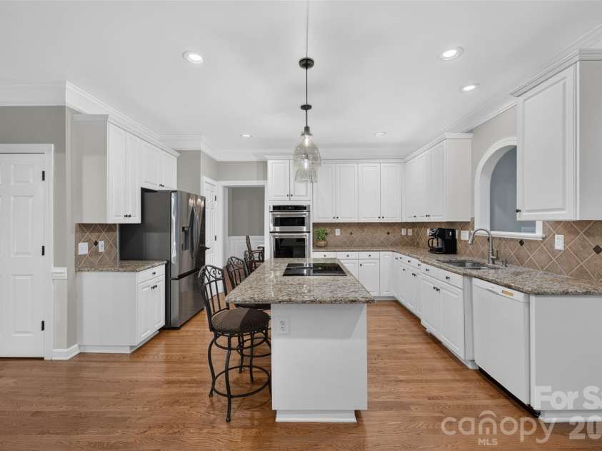 12604 Willingdon Road, Huntersville, NC 28078.  MLS# CAR4420497, YatesRealty ID 50186. Tons of counterspace in this thoughtfully laid out kitchen.