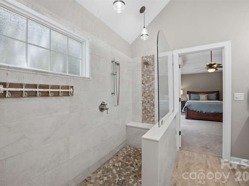 12604 Willingdon Road, Huntersville, NC 28078.  MLS# CAR4420497, YatesRealty ID 50186. Walk in shower with bench.