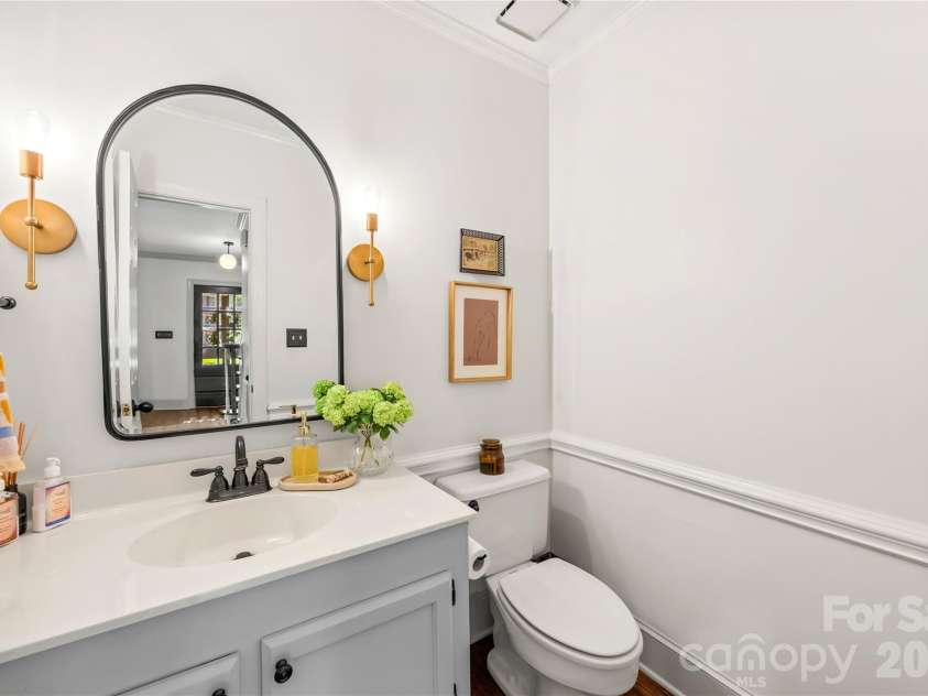 6616 Mays Chapel Lane, Charlotte, NC 28270.  MLS# CAR4419963, YatesRealty ID 50188. Downstairs half bath
