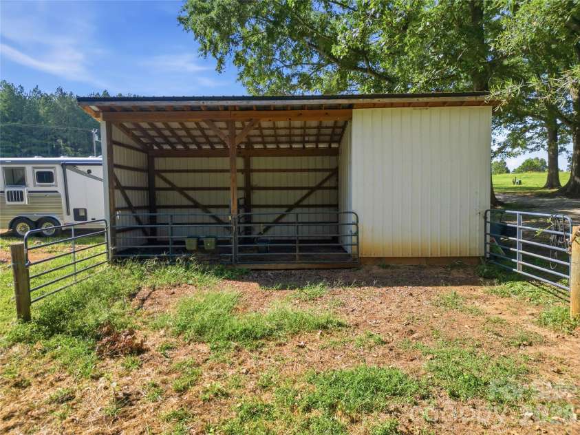 594 Rash Road, Olin, NC 28660.  MLS# CAR4417866, YatesRealty ID 50191. Barn with two stalls