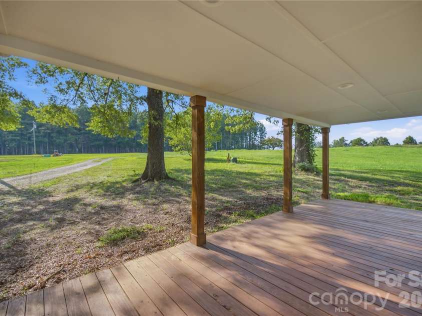594 Rash Road, Olin, NC 28660.  MLS# CAR4417866, YatesRealty ID 50191. Large front porch