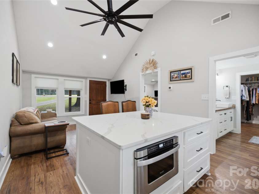 594 Rash Road, Olin, NC 28660.  MLS# CAR4417866, YatesRealty ID 50191. Microwave in kitchen island