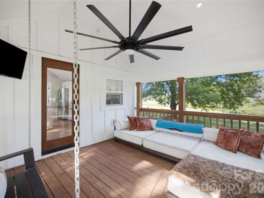 594 Rash Road, Olin, NC 28660.  MLS# CAR4417866, YatesRealty ID 50191. Screened in porch