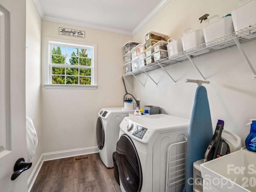 19 Glen Coe Drive, Fletcher, NC 28732.  MLS# CAR4418836, YatesRealty ID 50196. Spacious main level laundry room